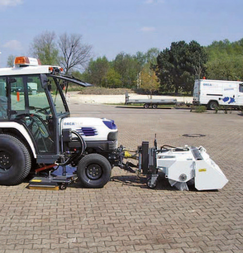 Maintain block paving with front mounted tractor sweeper. Collect the debris from between the joints to ensure block paving can drain as is is designed to.