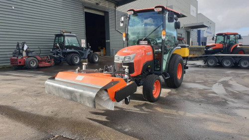 Kubota tractor with front linkage and Kersten KM 45 series front brush